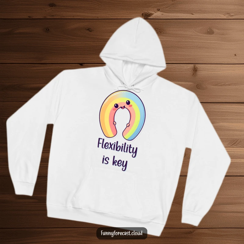 Funny cheerful kawaii rainbow character bending into a silly shape. A cozy and humorous hoodie for all.