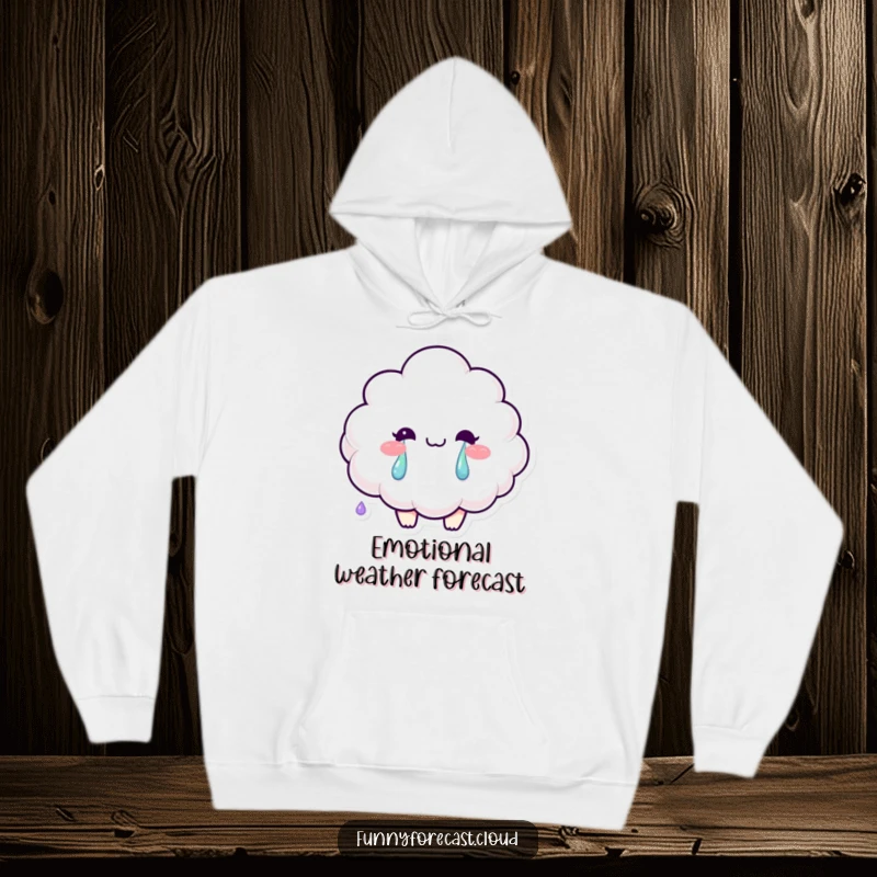Funny hoodie with a smiling fluffy cloud character crying vibrant rainbow tears, offering cozy emotional comfort.