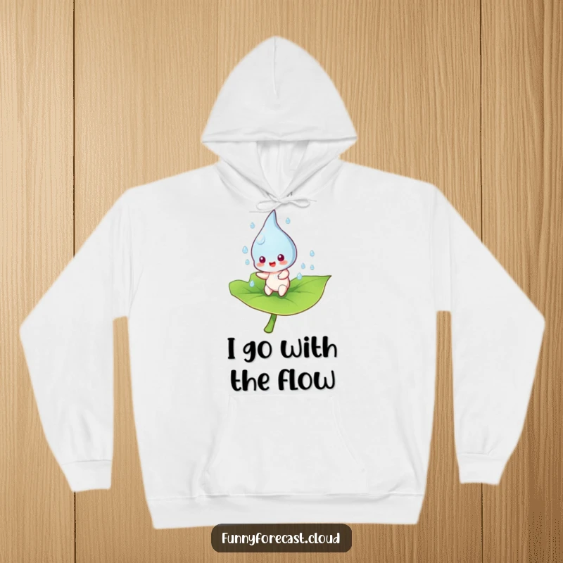 Funny raindrop character in a dynamic bounce on a leaf, depicted on a cozy hoodie, perfect for rainy day fun.