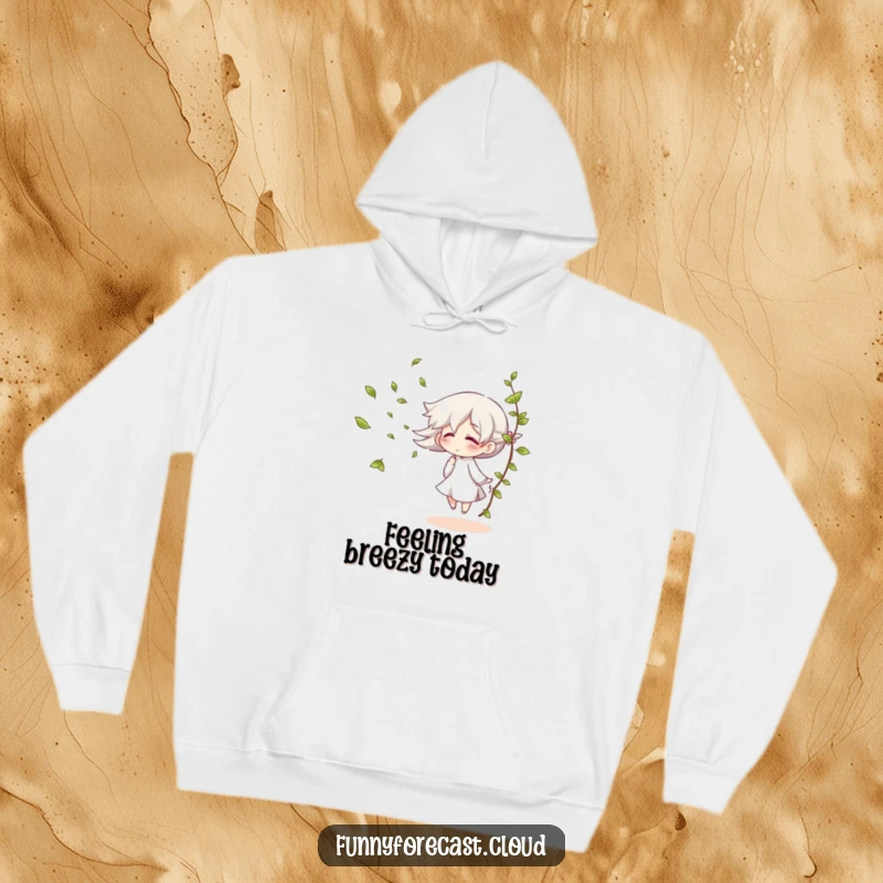 Funny hoodie with a giggling wind character blowing leaves, offering cozy and breezy comfort.